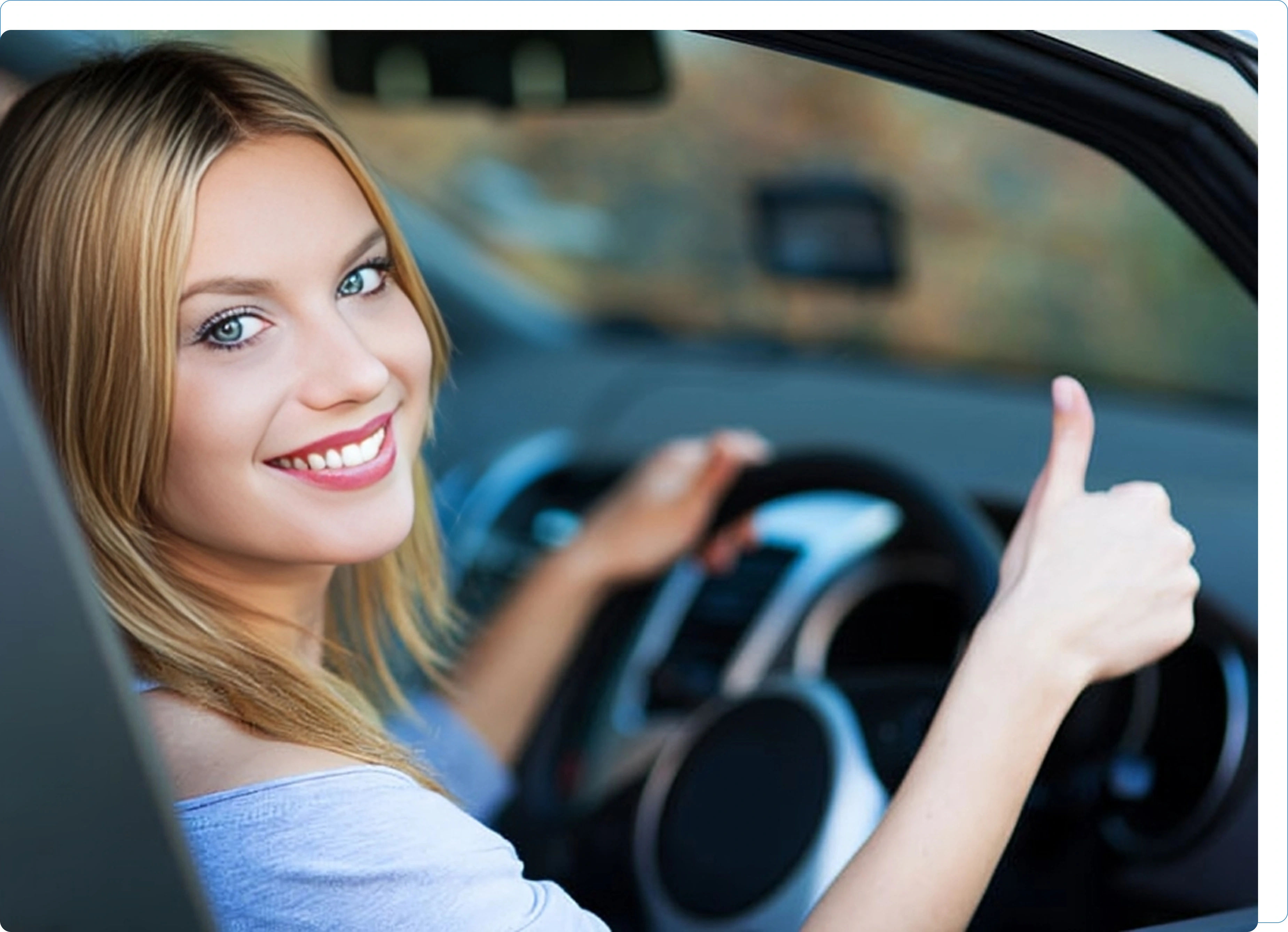 Woman smiling and giving thumbs up in car. Woman smiling and giving thumbs up in car.