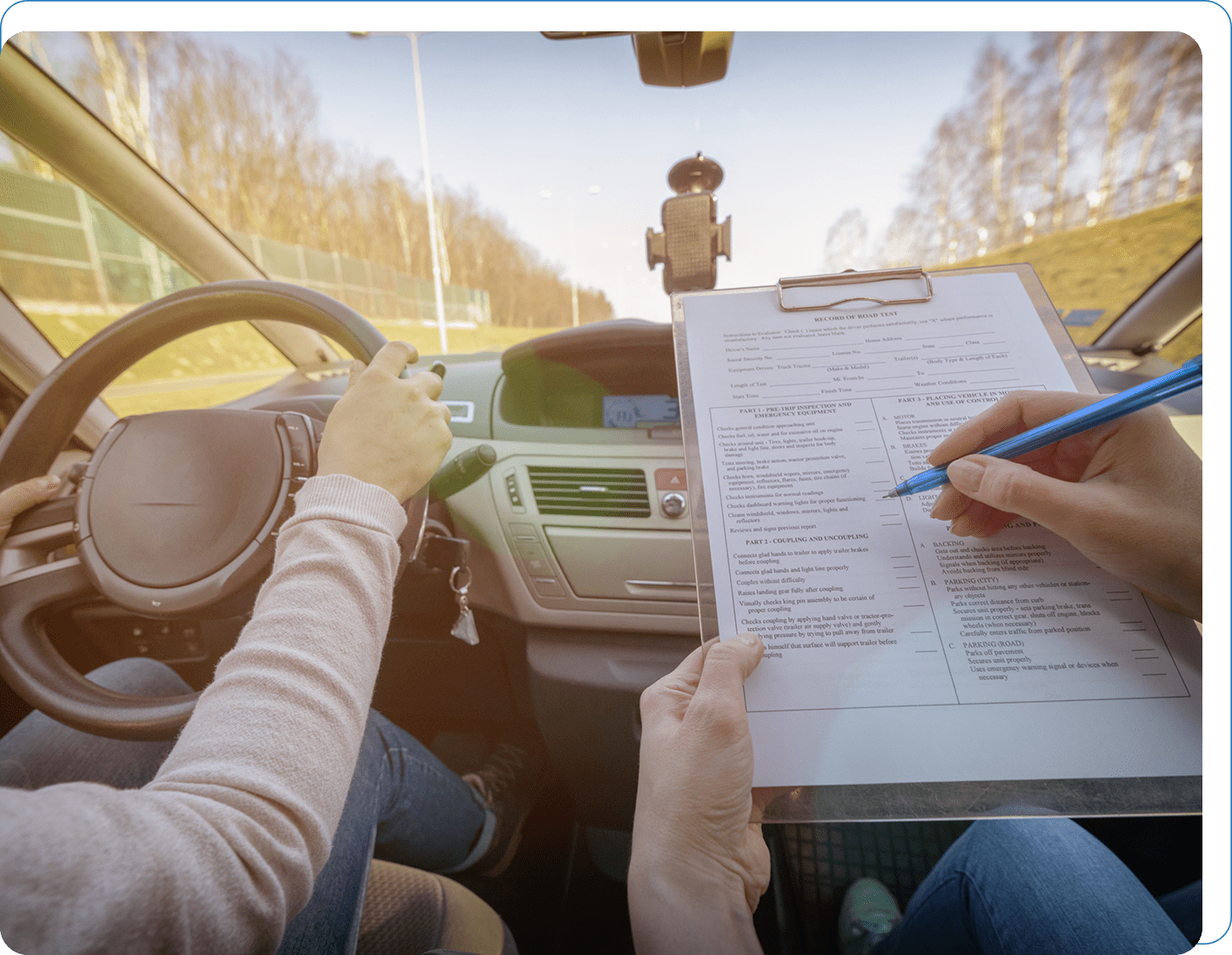 Driving test with examiner and clipboard.